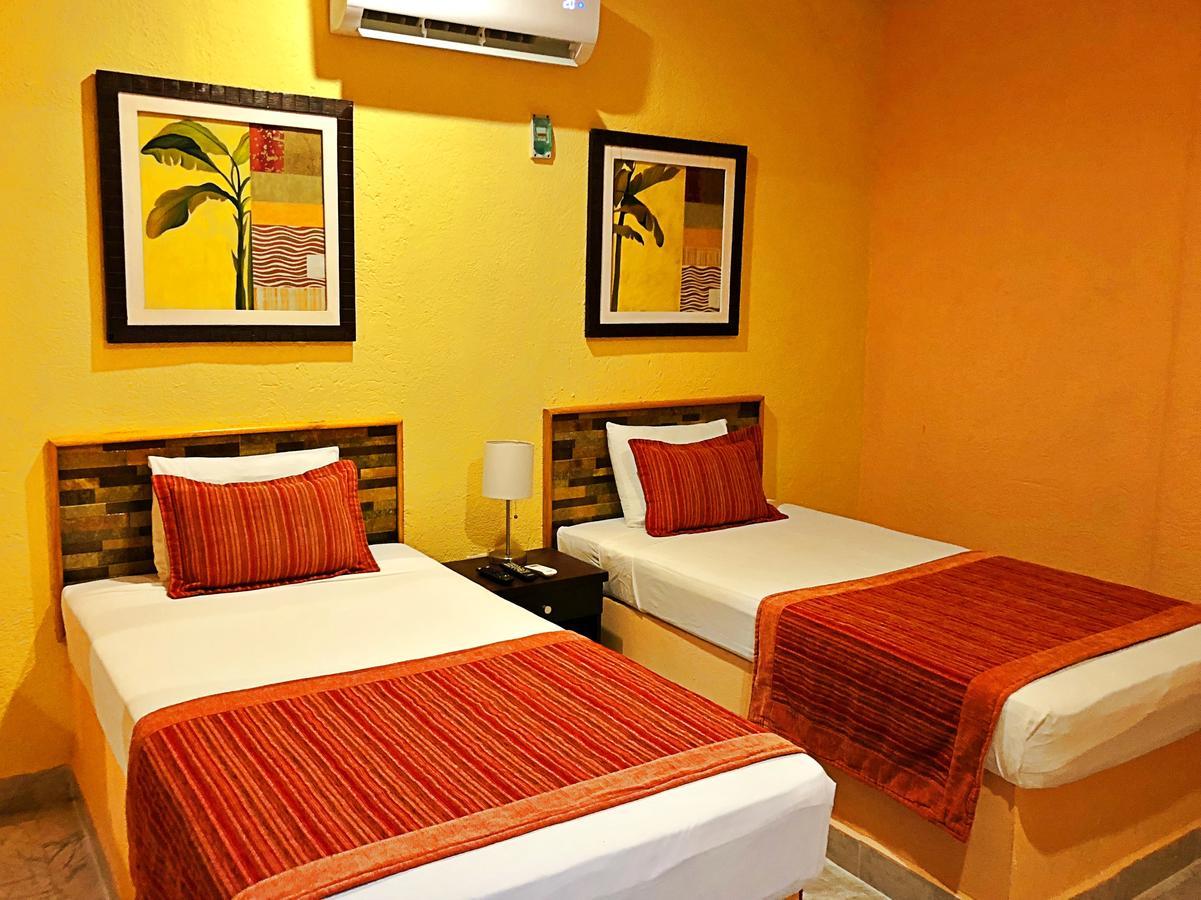 Hotel Versalles Suites Cancún Exteriör bild